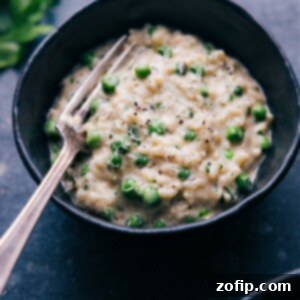 Creamy Instant Pot Risotto garnished with fresh herbs.