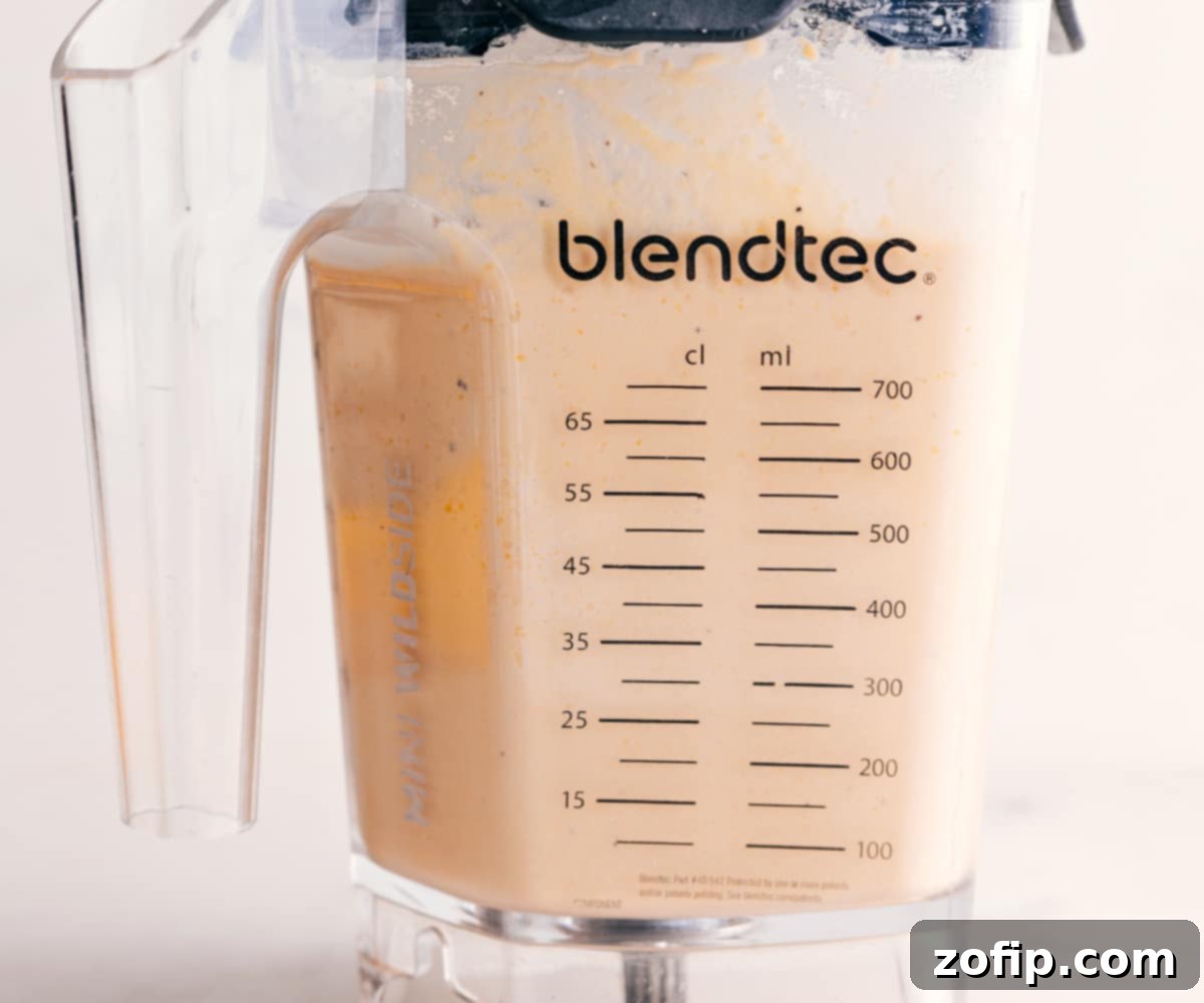 The Best Creamy Hummus for Dipping Perfectly blended, smooth hummus ready for serving, showcasing its ideal creamy consistency.