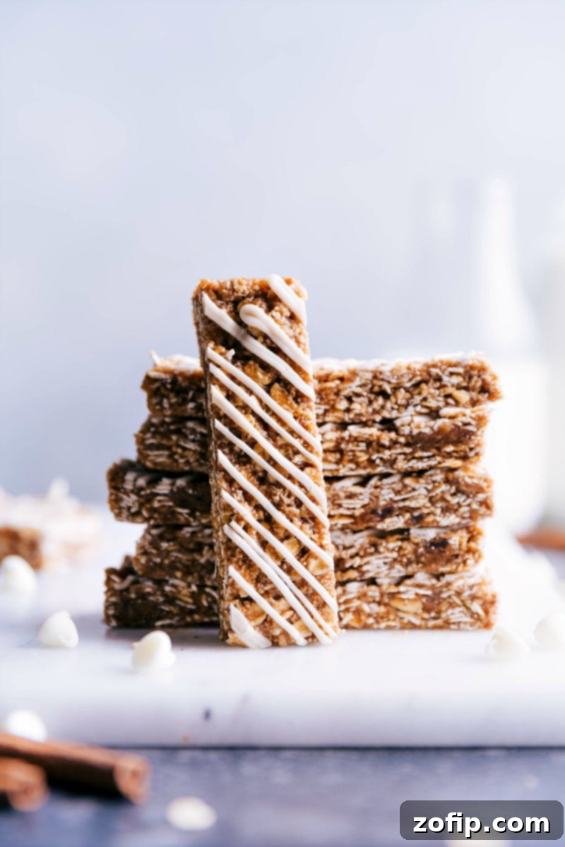 Close-up of Iced Oatmeal Granola Bars, highlighting the delicious white chocolate glaze on top.