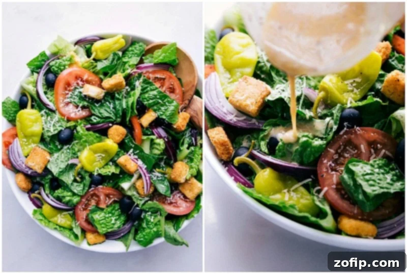 The iconic Olive Garden Salad with its signature creamy Italian dressing being generously poured over the crisp greens and fresh vegetables, creating a vibrant and appetizing display.