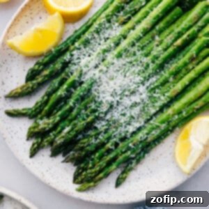 Asparagus Roasted Two Ways 3 Easy roasted asparagus with fresh parmesan cheese and lemon slices.