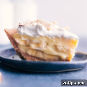 Beautifully garnished Banana Cream Pie, ready to be enjoyed.