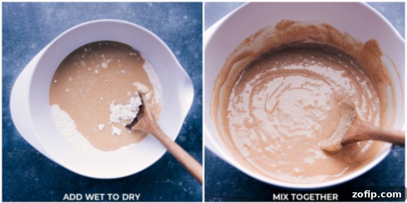Process shot illustrating how wet and dry ingredients are gently combined in a large bowl with a wooden spoon for Cinnamon Bread.