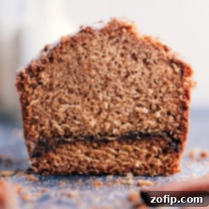 Final baked loaf of Cinnamon Bread, rich golden brown with a visible sugary crust.