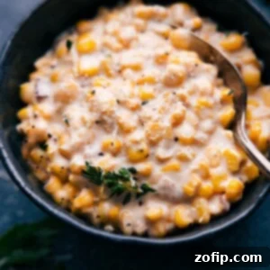 A beautiful bowl of homemade Creamed Corn with fresh herbs
