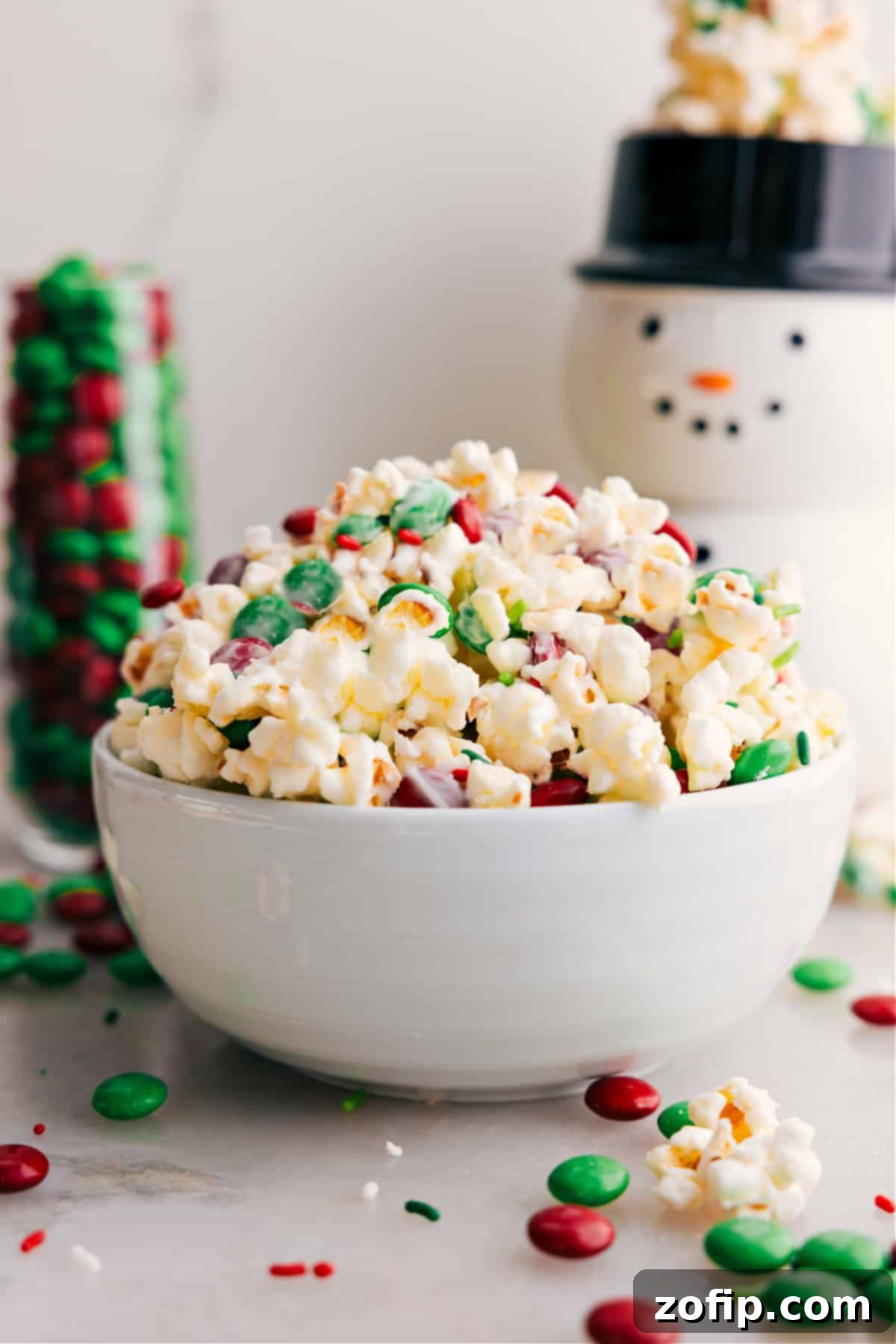 The Best Holiday Popcorn Recipe A big bowl of Christmas popcorn, perfect for a cozy movie night.
