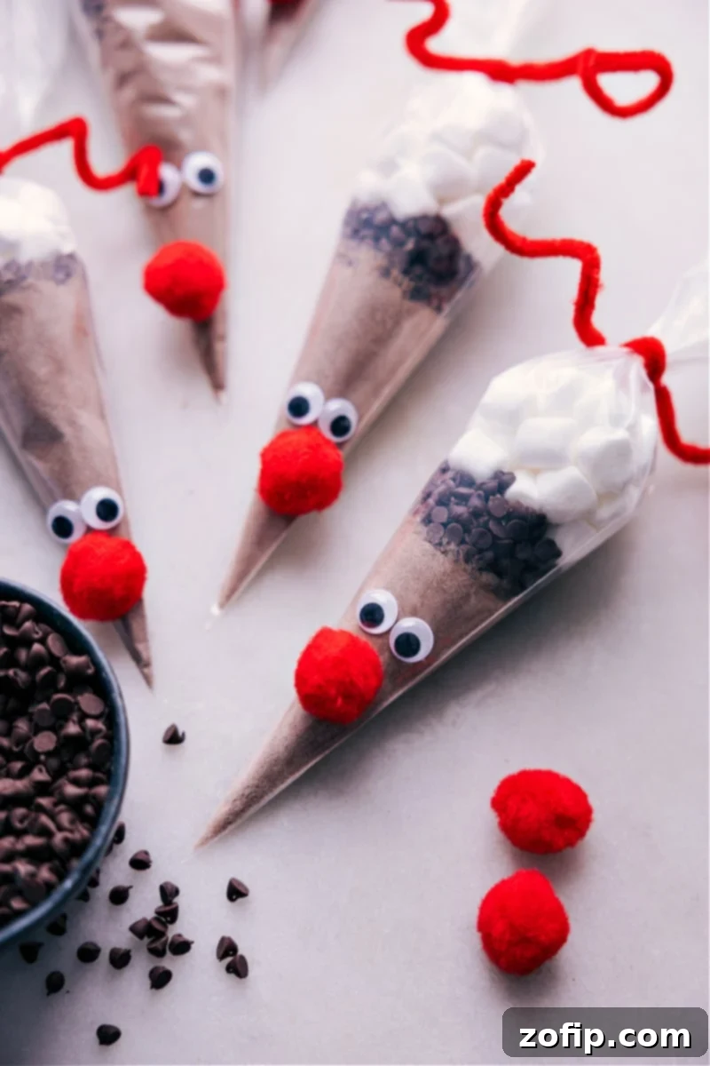 Overhead image of multiple Reindeer Hot Chocolate gifts beautifully arranged, ready for distribution.