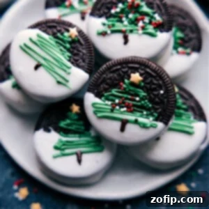 A selection of festive Christmas Oreos displayed on a white plate, showcasing the various designs.