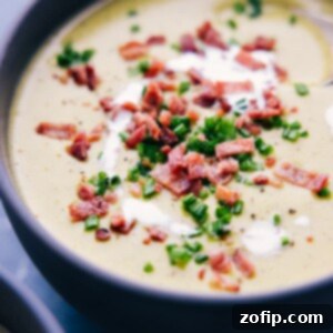 Creamy Broccoli Delight 8 A bowl of freshly made creamy cheesy broccoli soup ready to be served.