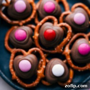 Love Twists 2 A finished Valentine's Pretzel, featuring a chocolate heart and red M&M.