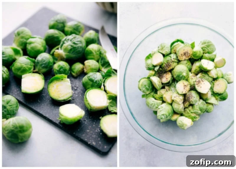A pair of hands demonstrating the process of chopping fresh Brussels sprouts on a rustic wooden cutting board, highlighting the preparatory stage of cooking.