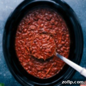Chili Con Carne in a bowl with toppings