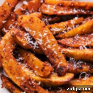 Golden Crispy Potato Wedges 6 Perfectly baked potato wedges seasoned with herbs and Parmesan cheese, ready to be enjoyed.