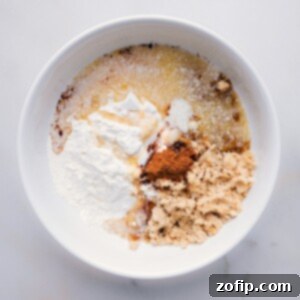 The Ultimate Streusel Guide 3 Flour, brown sugar, cinnamon, and salt are ready in a bowl for the streusel mixture.
