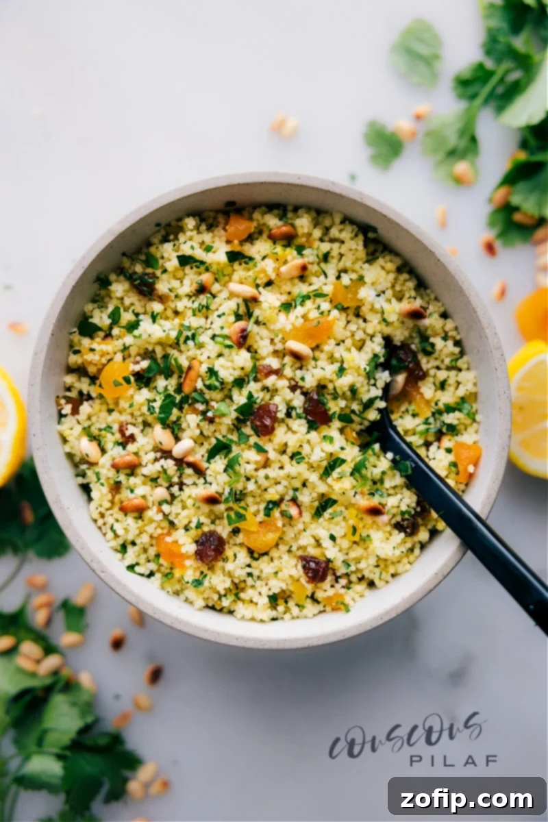 Couscous Recipe in a bowl with the mix-ins added in, ready to be served.