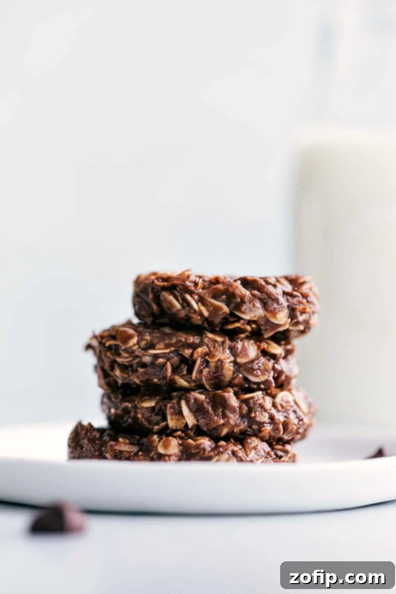 The famous chocolate and peanut butter no-bake cookies can be made with better-for-you ingredients (no refined sugars). These easy Healthy No-Bake Cookies can be made in 15 minutes or less and are truly the best! Healthy No-Bake Cookies, a stack of chocolate peanut butter cookies without refined sugar