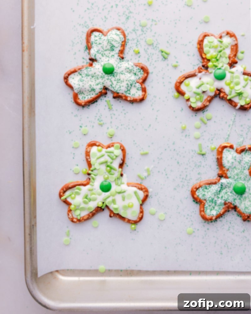 Lucky Pretzel Clovers 4 An overhead view of finished Pretzel Shamrocks arranged neatly on a baking tray.