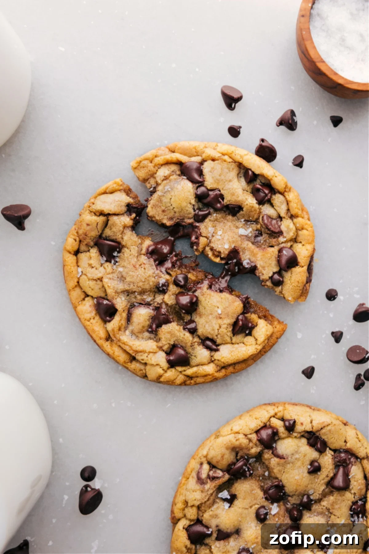 Single Serve Chocolate Chip Cookie Recipe Single serve chocolate chip cookie recipe broken apart showing the gooey, delicious inside.