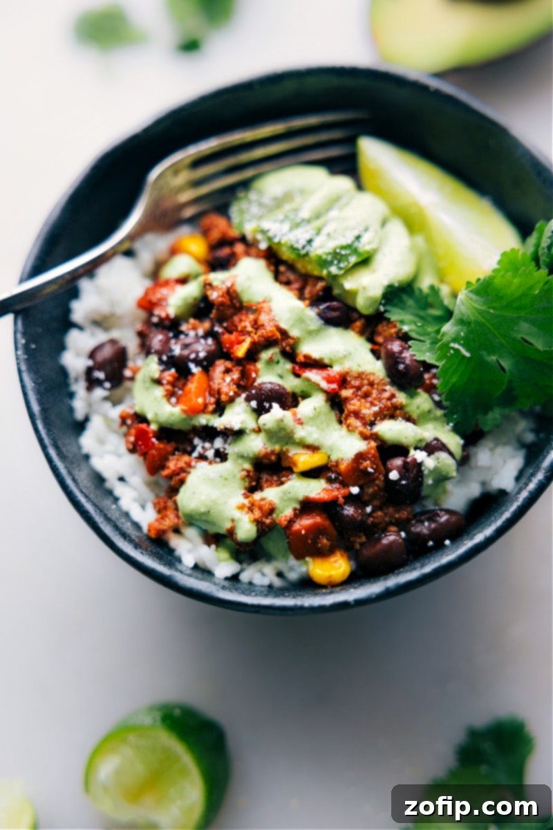 Delicious Turkey Lettuce Wraps filling in a bowl, showcasing its versatility for various healthy meal preparations. A flavorful and nourishing option. Overhead image of the cooked Turkey Lettuce Wraps filling served in a white bowl, demonstrating an alternative serving suggestion ideal for a heartier meal or a base for a burrito bowl.