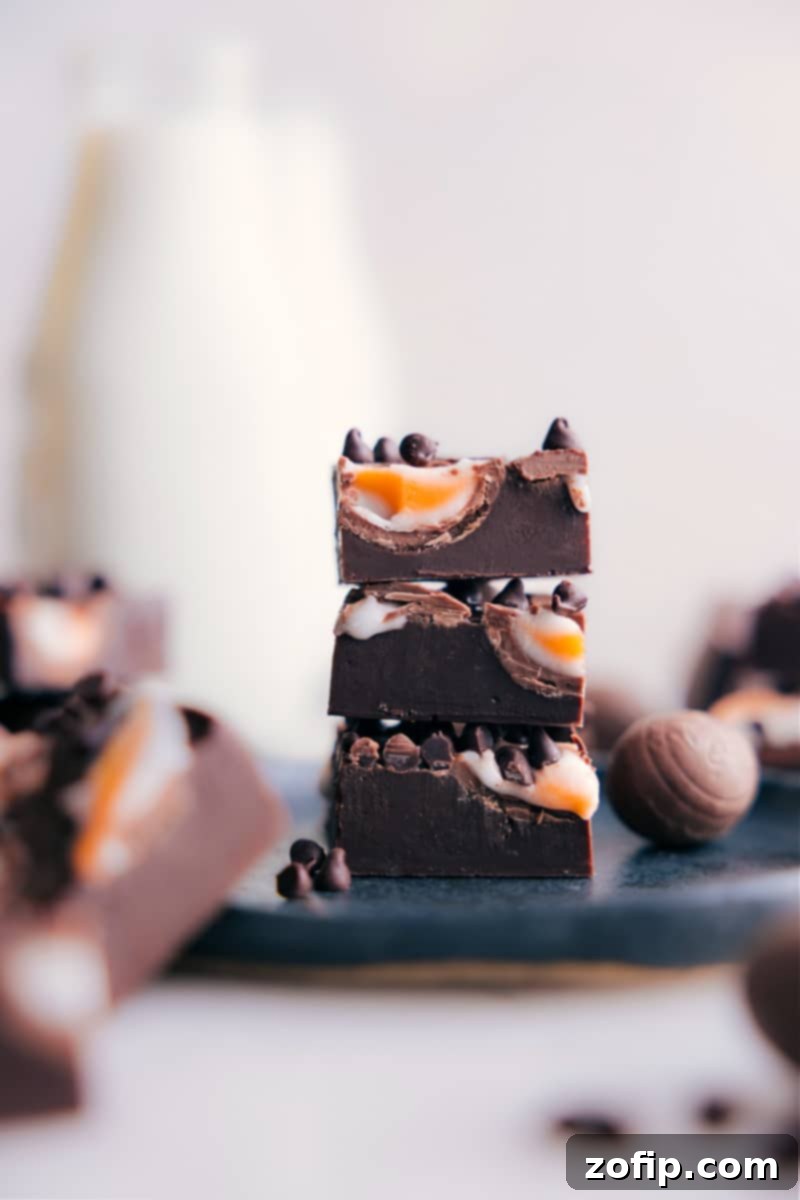 Image of the Easter Chocolate Creme Egg Fudge on a plate, ready to be enjoyed.