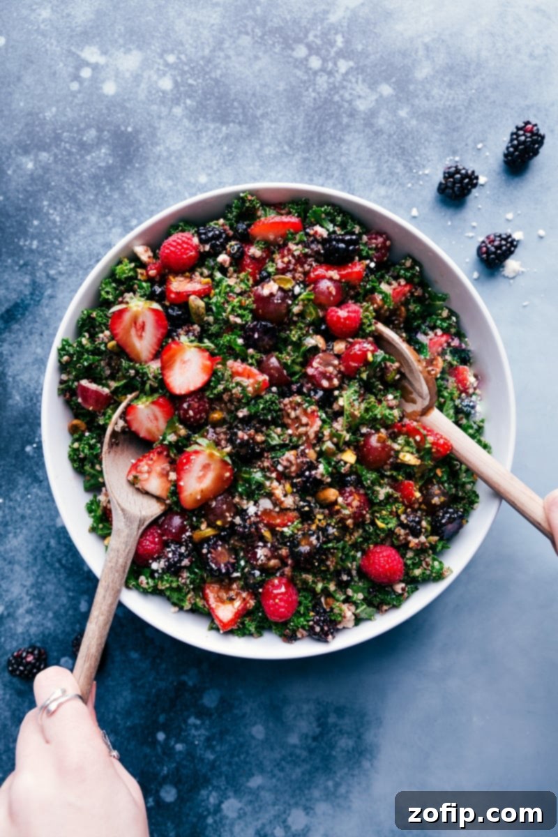 Overhead view of a beautifully prepared Kale and Quinoa Salad, vibrant with fresh ingredients.