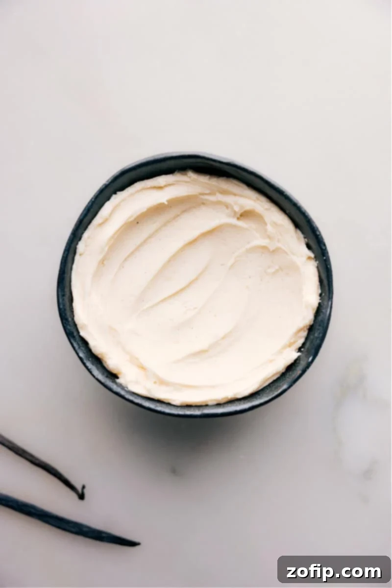 Overhead shot of a bowl brimming with smooth, creamy Vanilla Frosting, showcasing its perfect texture.