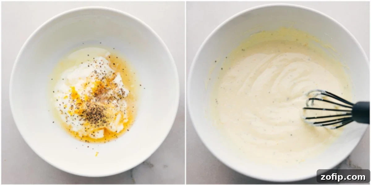 The creamy, mayo-free Greek yogurt dressing for the healthy chicken salad recipe being whisked together in a bowl.