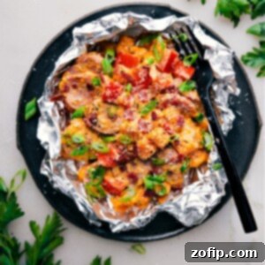 Delicious Creamy Sweet Potato and Sausage in a foil packet, ready to be served