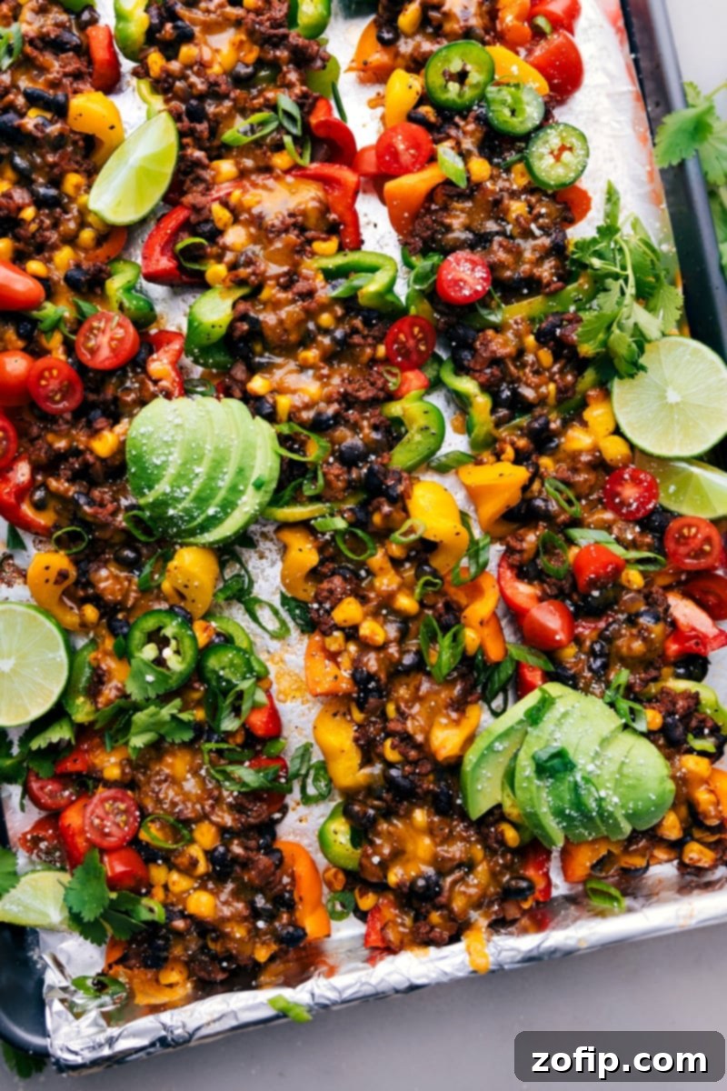 Overhead image of the vibrant Bell Pepper Nachos, showcasing seasoned ground beef and melted cheese on colorful bell pepper wedges, garnished with fresh cilantro.