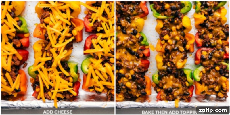 A close-up of a perfectly baked serving of Bell Pepper Nachos, garnished generously with fresh cilantro and a creamy dollop of sour cream, ready to be devoured.