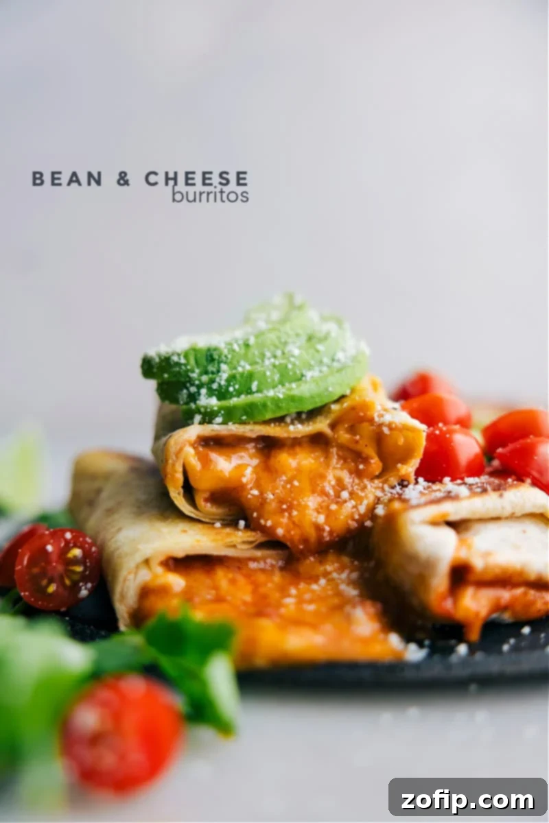 Crispy, golden-brown bean and cheese burritos ready to be topped with fresh ingredients.