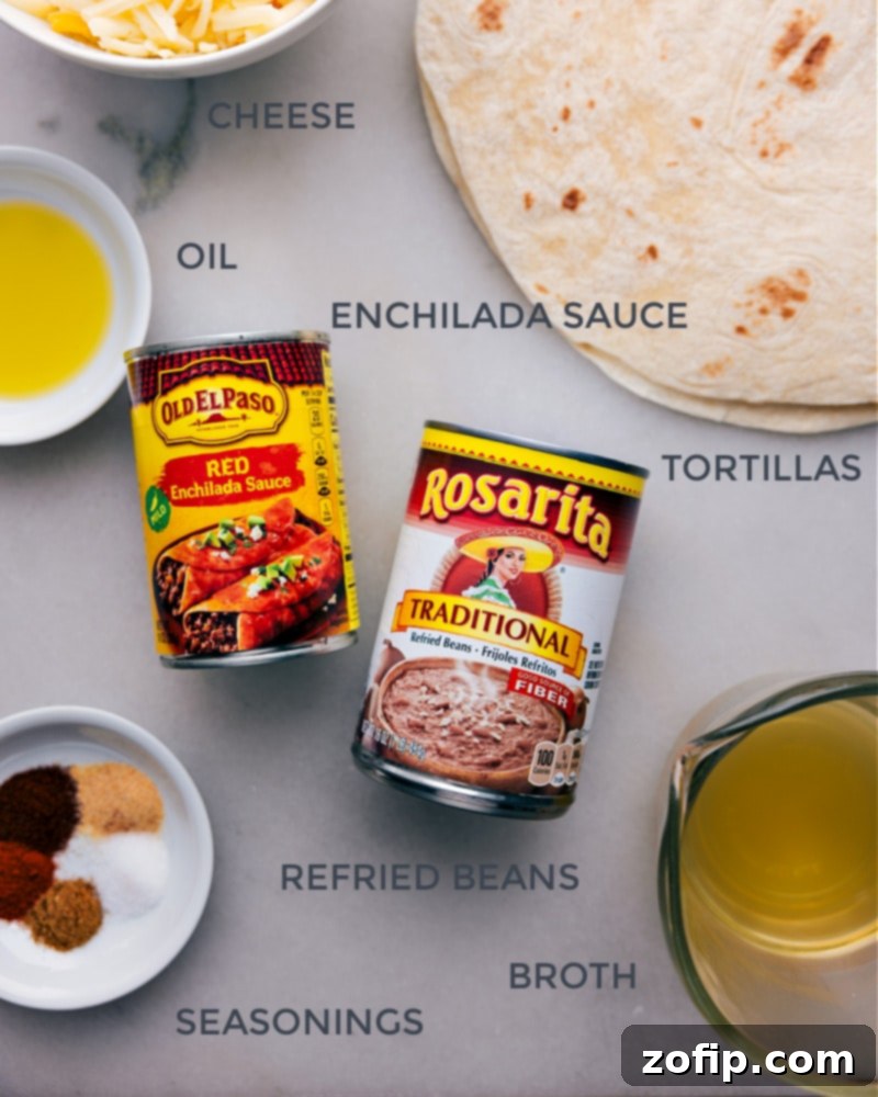 A flat lay image displaying all fresh ingredients needed for making bean and cheese burritos: spices, beans, broth, tortillas, enchilada sauce, and cheddar cheese.