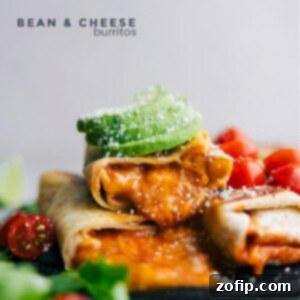 Close-up of a delicious bean and cheese burrito, baked to perfection.