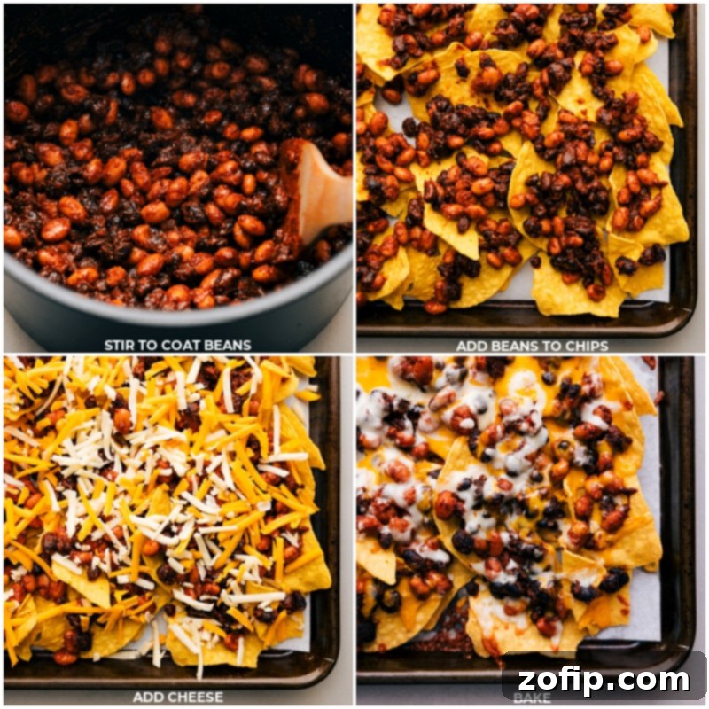 The absolute best Vegetarian Nachos I've ever had! These are sure to be a hit with everyone at the table, from dedicated carnivores to veggie lovers! Recipe via chelseasmessyapron #dinner #quick #easy #simple #familyfriendly #kidfriendly #comfortfood #nomeat #beans #chips #vegetarian #nachos Close-up process shot of layered vegetarian nachos, with seasoned beans and shredded cheese spread over chips, ready for baking.