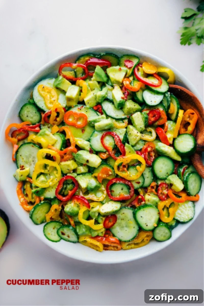 The Best Cucumber Pepper Salad Recipe A bowl of vibrant Cucumber Pepper Salad, dressed and ready to be enjoyed.
