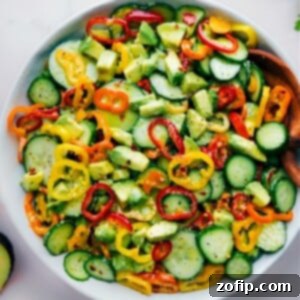 Vibrant Cucumber Pepper Medley 2 Finished Cucumber-Pepper Salad in a rustic bowl.
