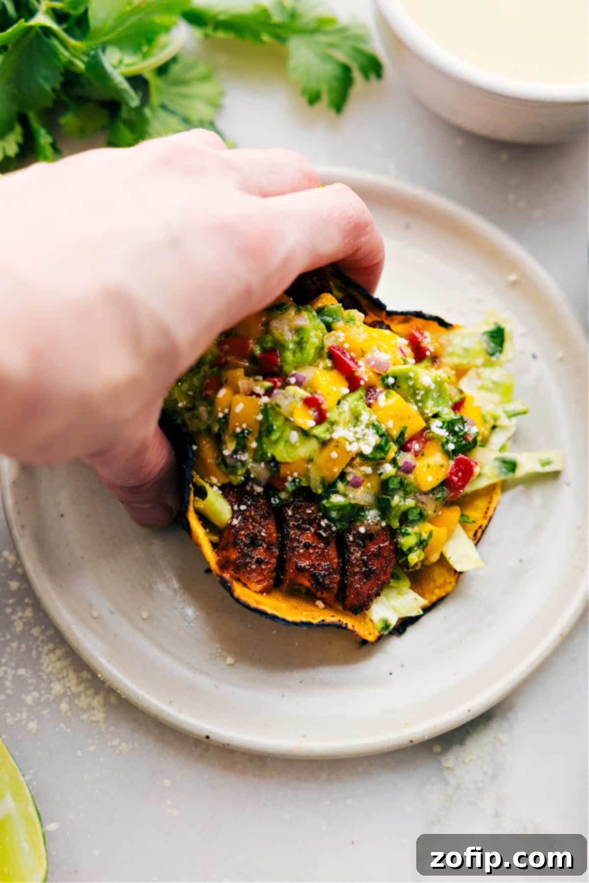 Exquisite Salmon Tacos arranged beautifully on a plate with all the vibrant toppings, ready to be enjoyed.