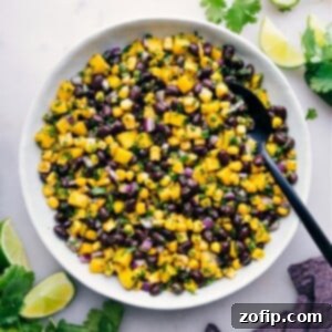 Vibrant Mango Black Bean Salsa 2 A vibrant bowl of Mango Black Bean Salsa, captured from above, ready to be served and enjoyed.