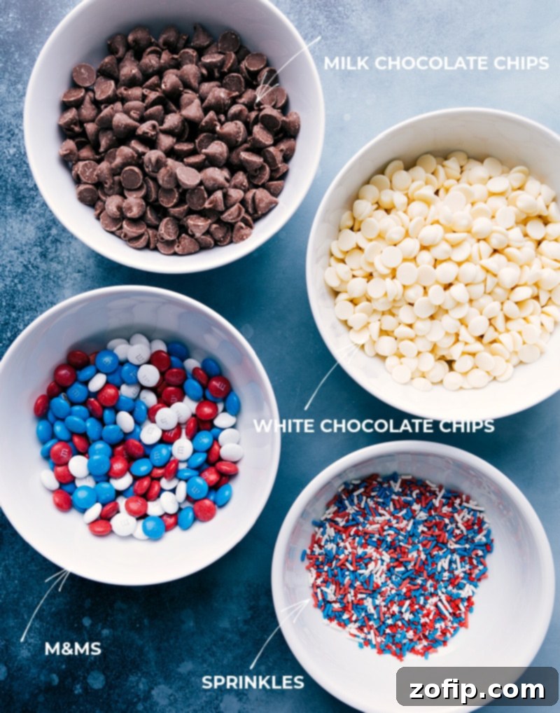 Key ingredients for 4th of July Bark laid out: milk chocolate chips, white chocolate chips, red, white, and blue M&M's, and star sprinkles, ready for preparation.