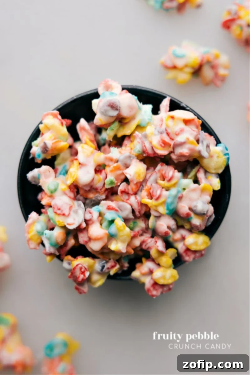 Overhead image of the Fruity Pebble Crunch Candy, showcasing colorful clusters on a baking sheet