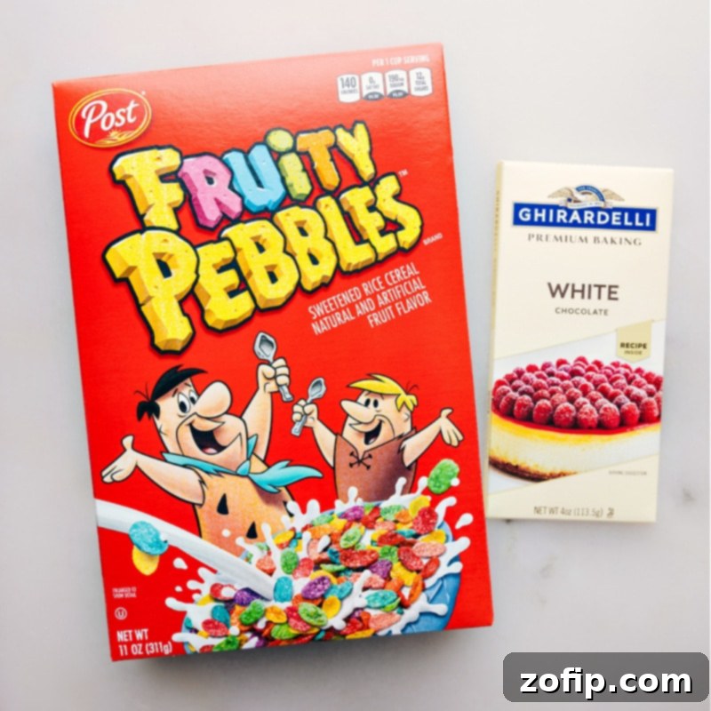 Ingredient shot showing Fruity Pebbles cereal, white chocolate bar, and coconut oil