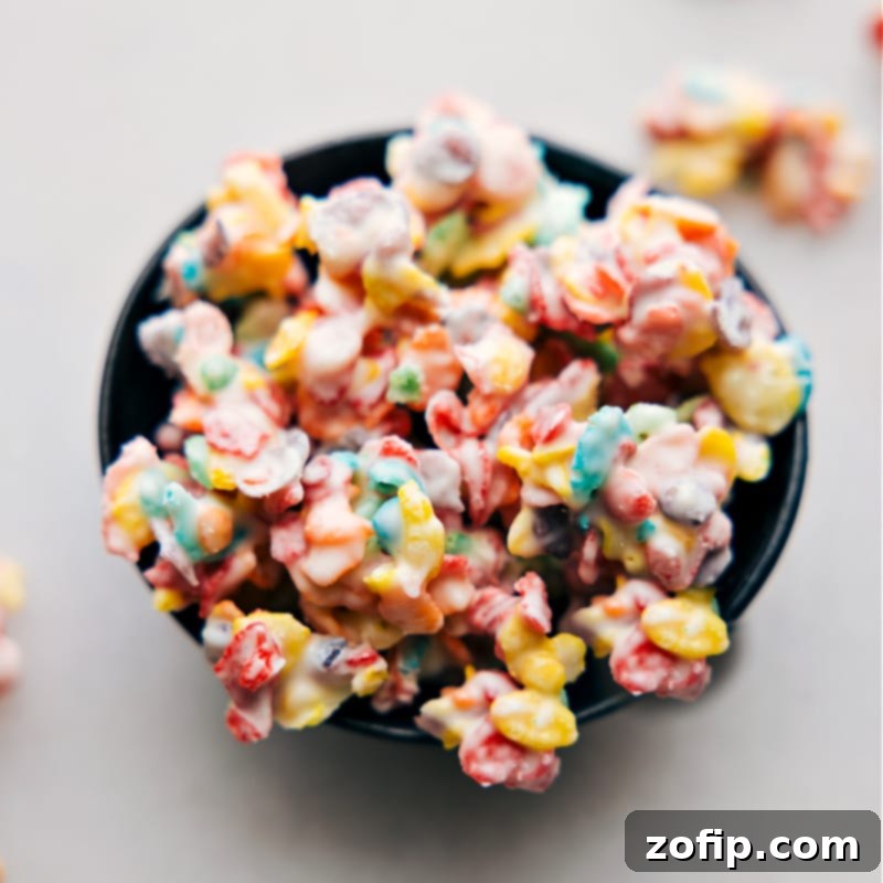 Overhead image of the Fruity Pebble Crunch Candy in a bowl, ready to be enjoyed, showing off the vibrant colors