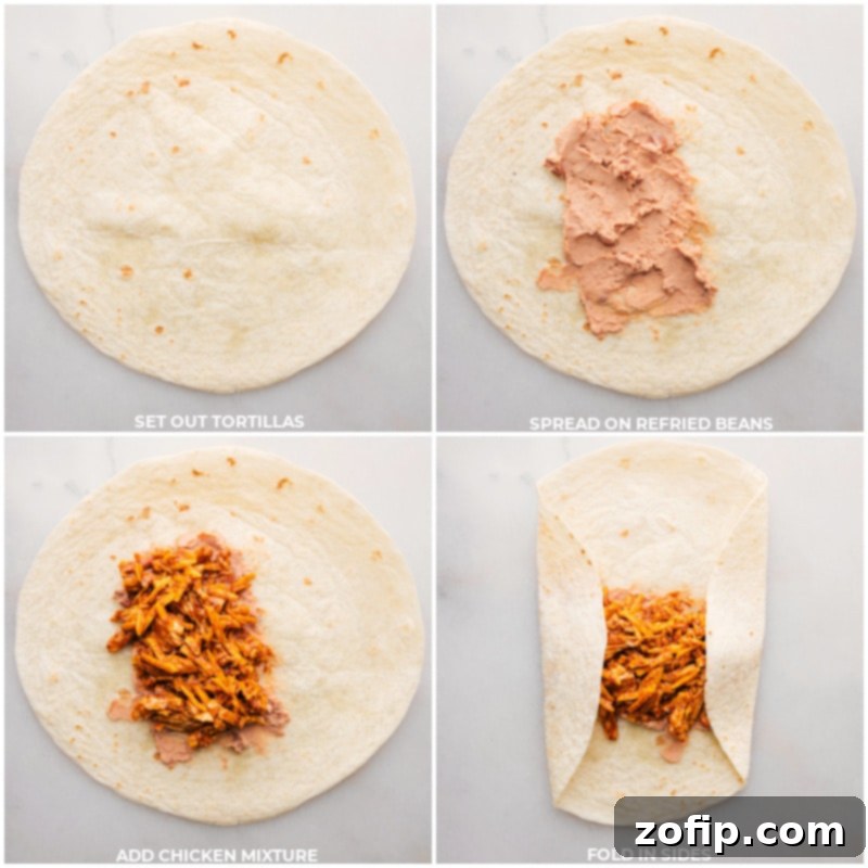 Refried beans and chicken filling spread onto large flour tortillas before folding