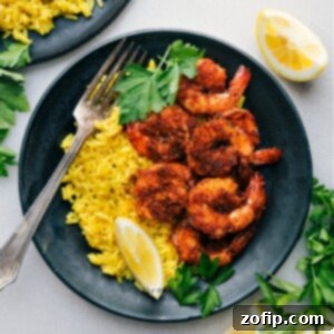 Delicious Blackened Shrimp with Yellow Rice, ready to serve.