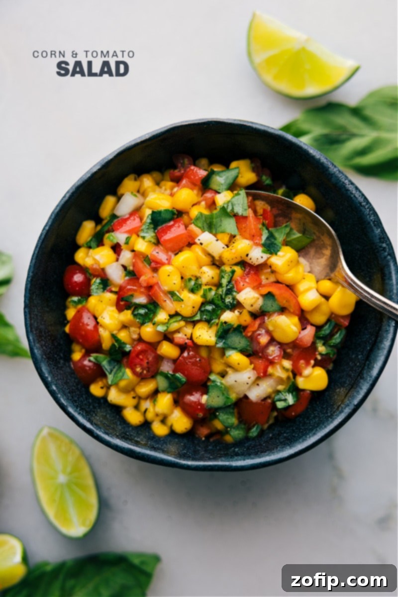Overhead image of the vibrant Corn and Tomato Salad in a serving bowl, showcasing its colorful ingredients.