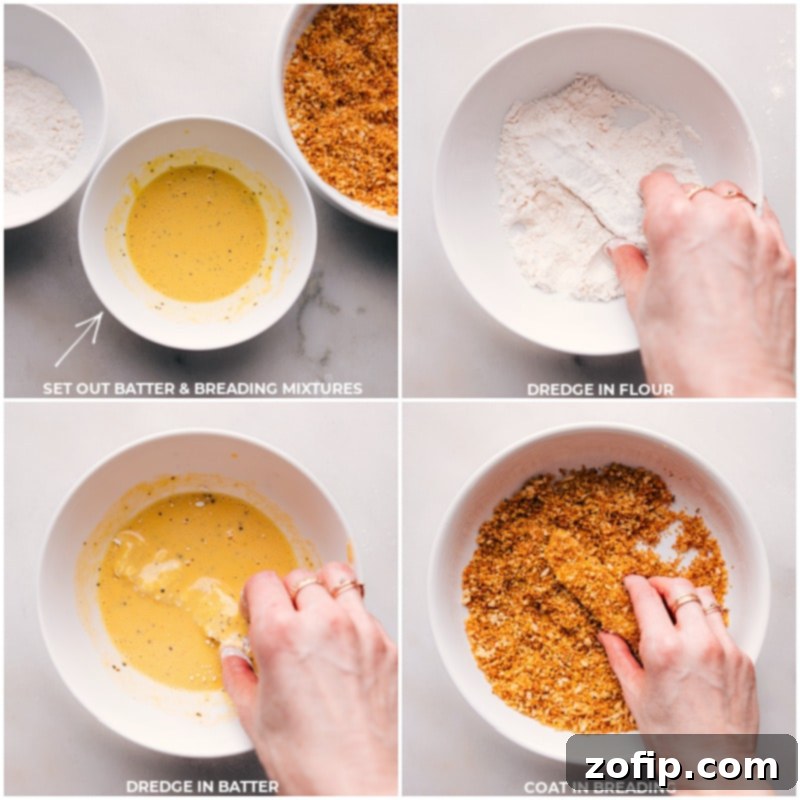 Dredging cod pieces in flour, egg wash, and panko for a perfect crispy crust. Process shots: Fish being dredged in flour, then coated in the egg mixture, then finally breaded with panko.