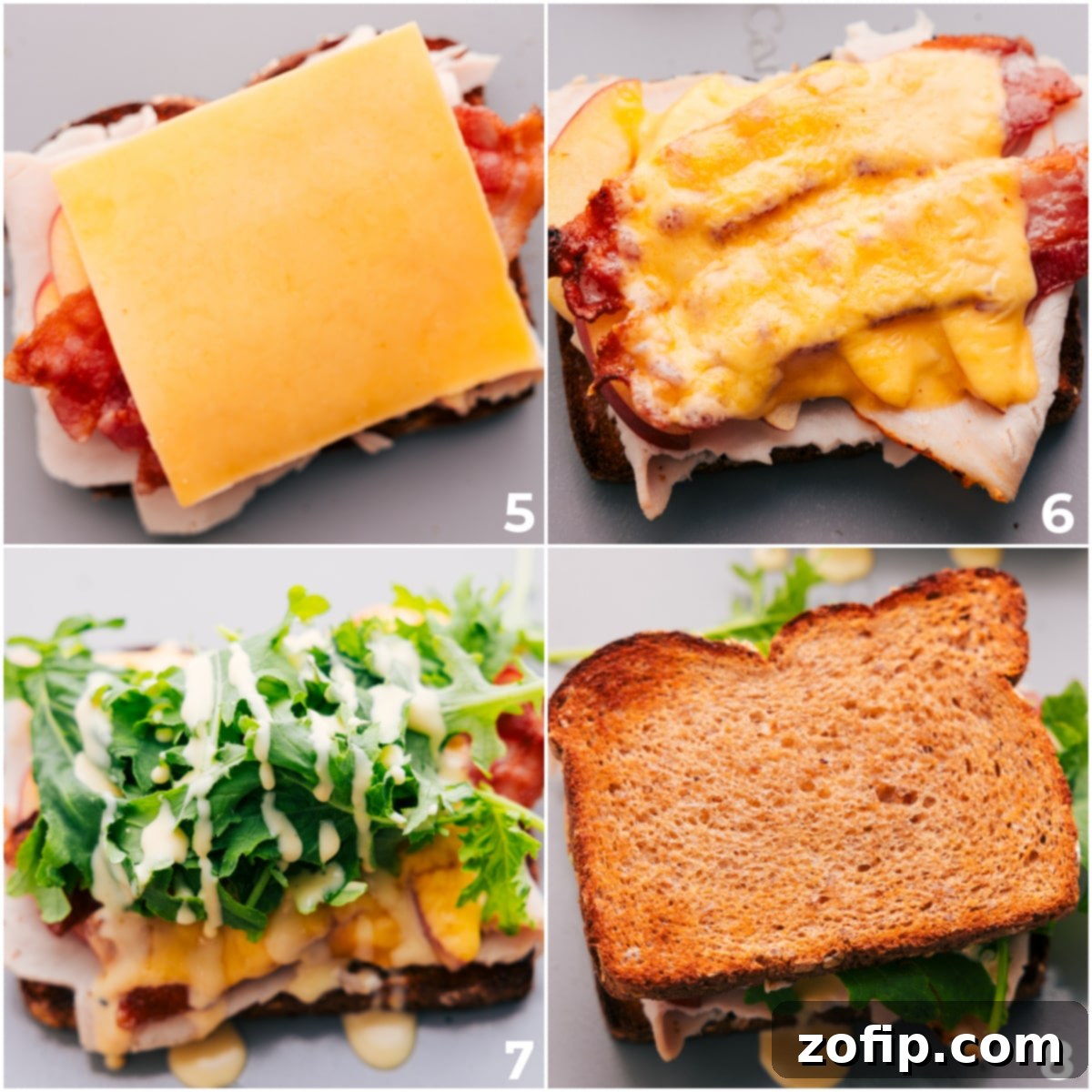 The finished turkey sandwich, with melted Gouda cheese, fresh mixed greens, and a generous drizzle of Honey-Dijon dressing, showcasing its golden-toasted bread.