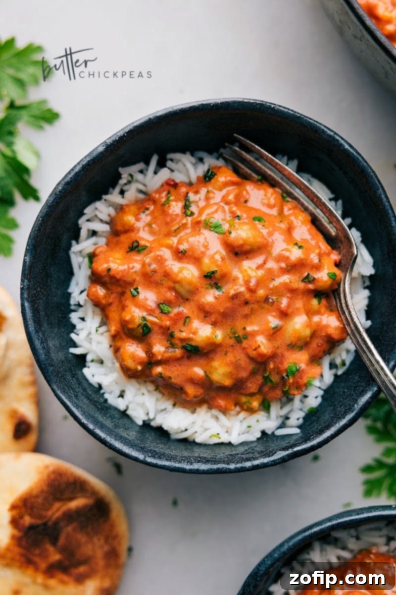 Overhead image of the Butter Chickpeas dish, ready to be served with rice and naan