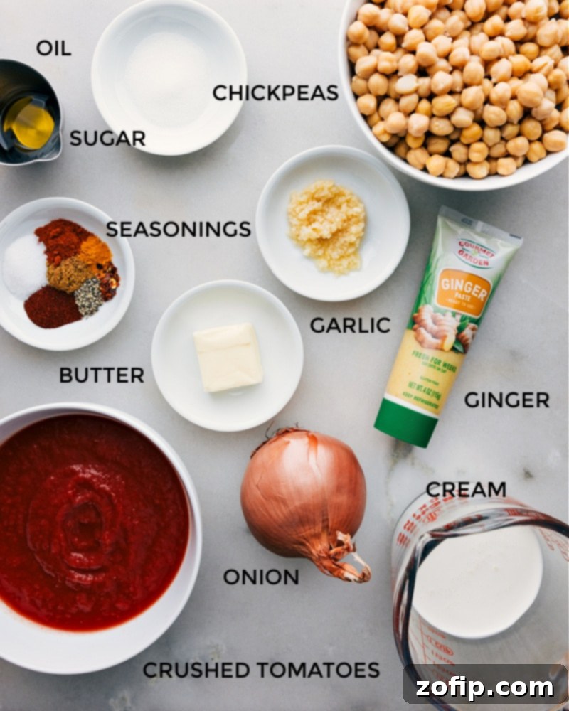 Ingredients laid out for Butter Chickpeas recipe