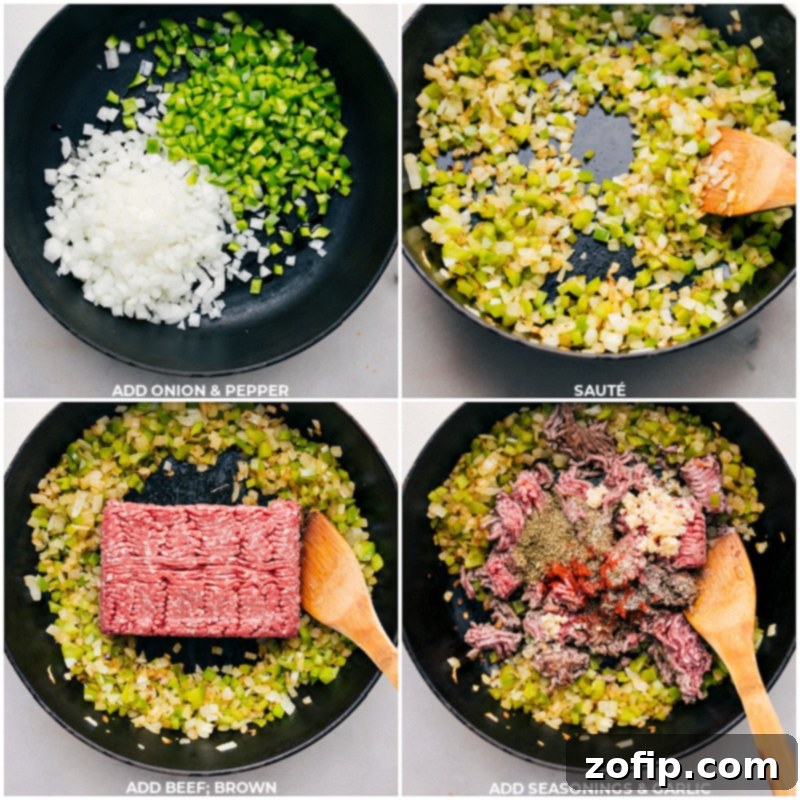 Onions, green bell peppers, ground beef, Italian seasoning, paprika, and minced garlic sautéing together in a large cast-iron skillet for Philly Cheesesteak Sloppy Joes.